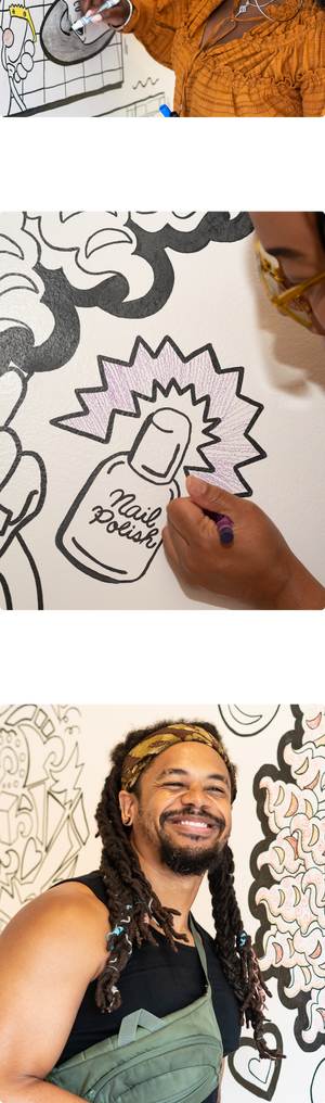 People coloring the walls at the coloring museum