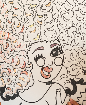 Illustration by Naturally ILLustrated of a woman with big, natural, beautiful hair on the wall at the Coloring Museum for guests to color in 